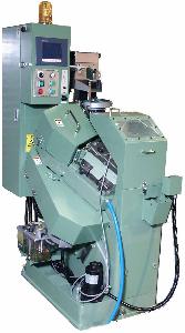 スレッドローリングマシン（ねじ転造機）の写真